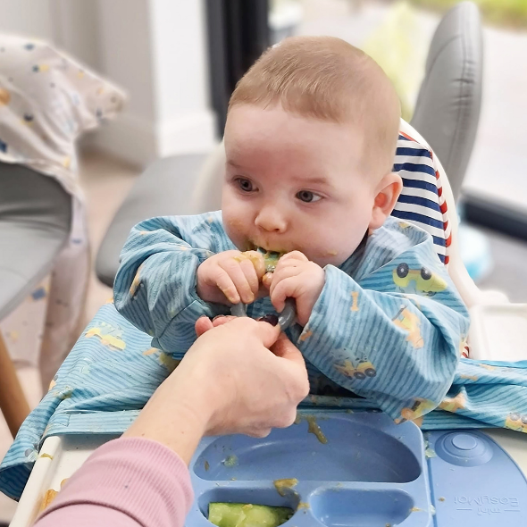 The first two-handed baby spoon, making mealtimes more rewarding